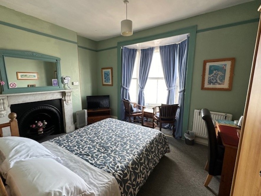 One of the many bedrooms previously used for lettings